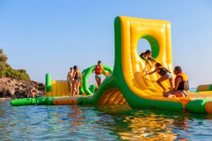 Neos,Marmaras,,Greece,,07.21.2022.,Inflatable,Bounce,Castle,Floating,In,Water.aqua